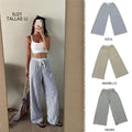 Pantalones anchos a rayas con cintura elástica y cordón