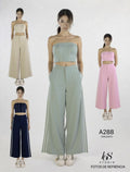 Conjunto de top bandeau y pantalones anchos con rayas laterales, estilo casual y atrevido